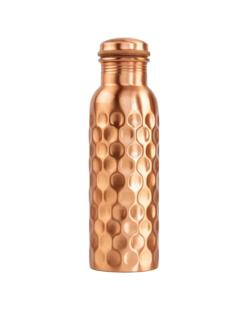 Hand-hammered copper bottle with a diamond facet pattern