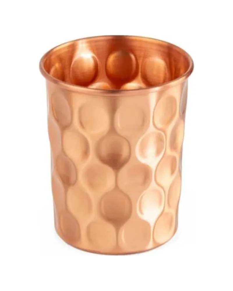 Hand-hammered copper cup with a diamond facet pattern